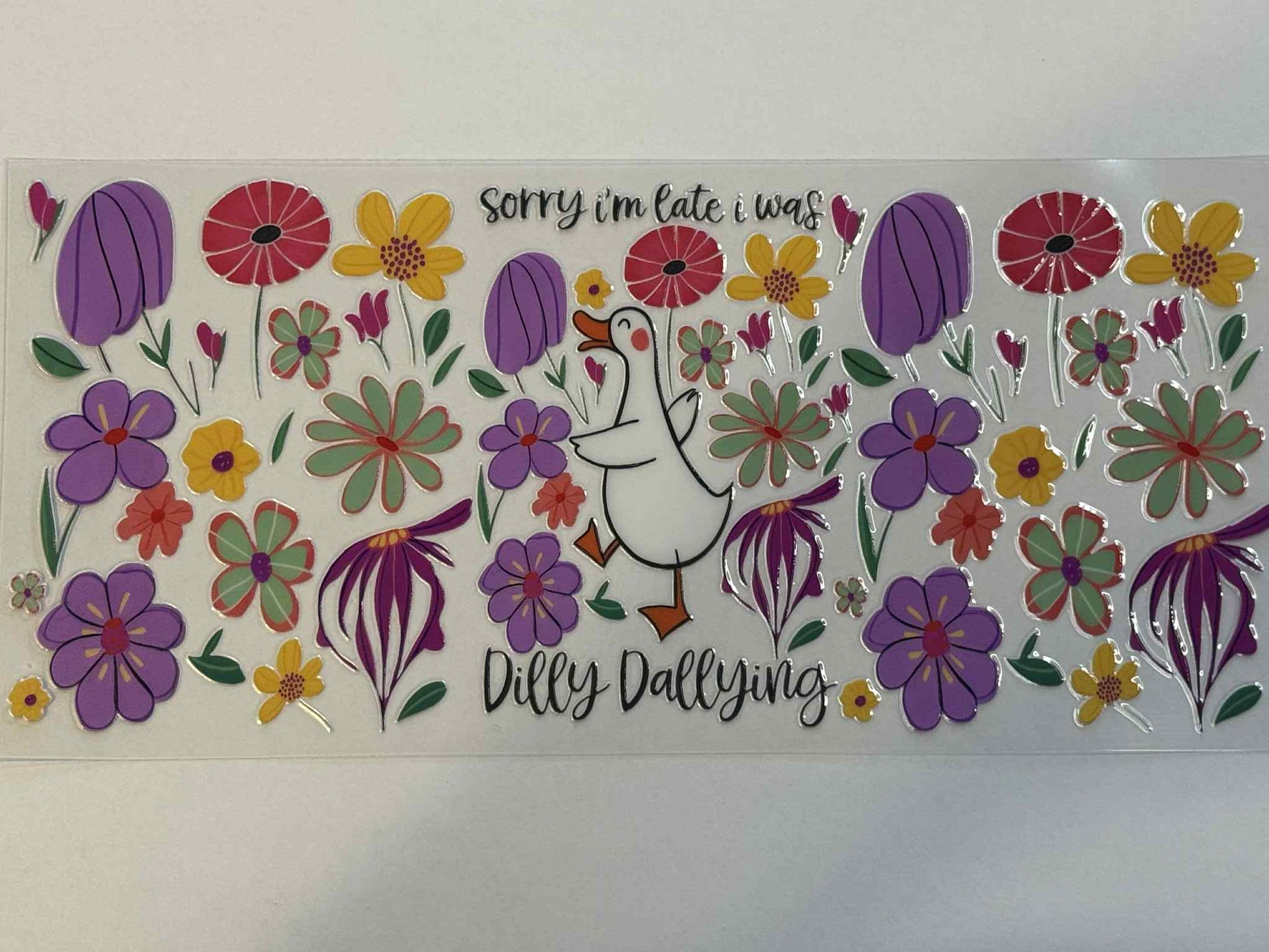 Sheet of colorful floral stickers with a unicorn design on a white background